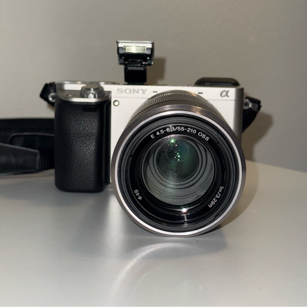 Sony a6000 - 24.3 MP Mirrorless Camera Body & 55‑210mm OSS Lens - Silver